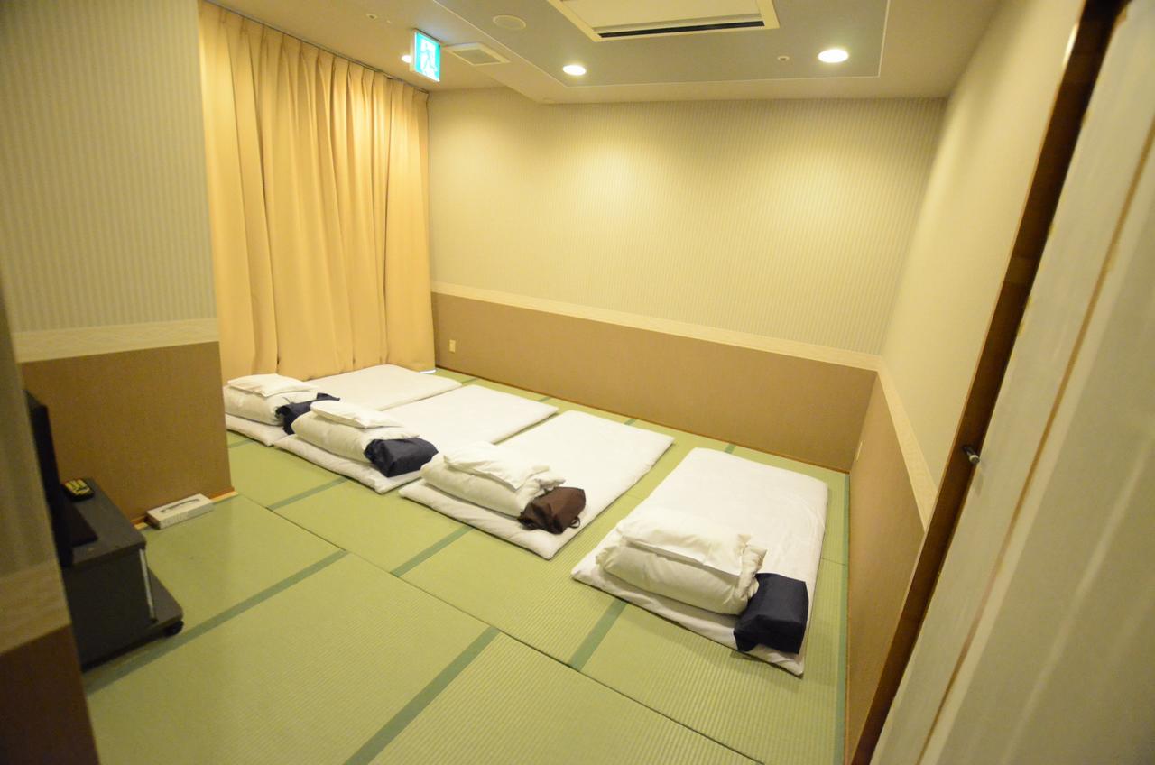Kumamoto Capsule Hotel Bagian luar foto